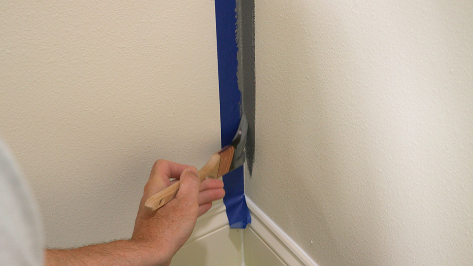 using tape to cleanly paint a corner